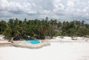 Гостиница Kusini Beach Cottages  Diani Beach